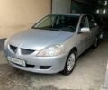 Сірий Міцубісі Lancer, об'ємом двигуна 1.6 л та пробігом 196 тис. км за 4700 $, фото 3 на Automoto.ua