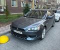 Сірий Міцубісі Lancer, об'ємом двигуна 2 л та пробігом 229 тис. км за 6000 $, фото 1 на Automoto.ua