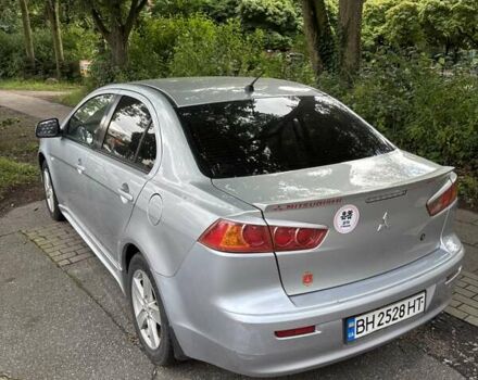 Серый Мицубиси Лансер, объемом двигателя 2 л и пробегом 183 тыс. км за 7500 $, фото 3 на Automoto.ua
