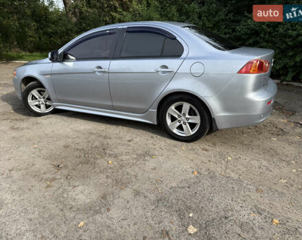 Серый Мицубиси Лансер, объемом двигателя 2 л и пробегом 175 тыс. км за 7300 $, фото 3 на Automoto.ua