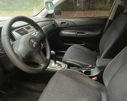Сірий Міцубісі Lancer, об'ємом двигуна 1.6 л та пробігом 176 тис. км за 4999 $, фото 19 на Automoto.ua