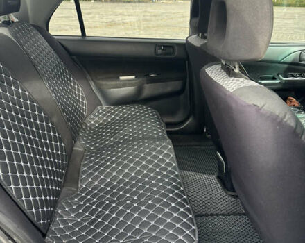 Серый Мицубиси Лансер, объемом двигателя 1.6 л и пробегом 222 тыс. км за 5200 $, фото 16 на Automoto.ua