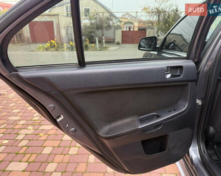 Сірий Міцубісі Lancer, об'ємом двигуна 2 л та пробігом 92 тис. км за 8200 $, фото 27 на Automoto.ua