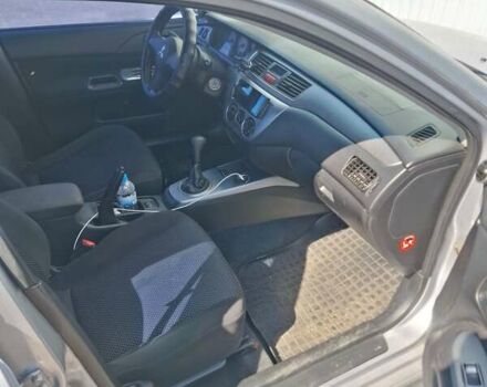Сірий Міцубісі Lancer, об'ємом двигуна 1.6 л та пробігом 217 тис. км за 6000 $, фото 2 на Automoto.ua