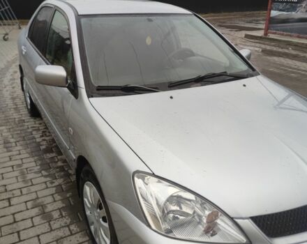 Серый Мицубиси Лансер, объемом двигателя 1.6 л и пробегом 225 тыс. км за 3100 $, фото 1 на Automoto.ua