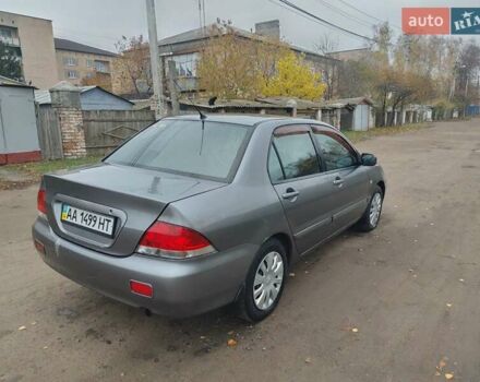 Сірий Міцубісі Lancer, об'ємом двигуна 1.58 л та пробігом 1 тис. км за 2850 $, фото 5 на Automoto.ua