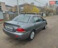 Сірий Міцубісі Lancer, об'ємом двигуна 1.58 л та пробігом 1 тис. км за 2850 $, фото 5 на Automoto.ua