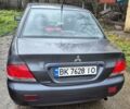 Сірий Міцубісі Lancer, об'ємом двигуна 1.6 л та пробігом 230 тис. км за 4400 $, фото 3 на Automoto.ua