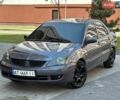 Серый Мицубиси Лансер, объемом двигателя 1.58 л и пробегом 270 тыс. км за 2950 $, фото 1 на Automoto.ua