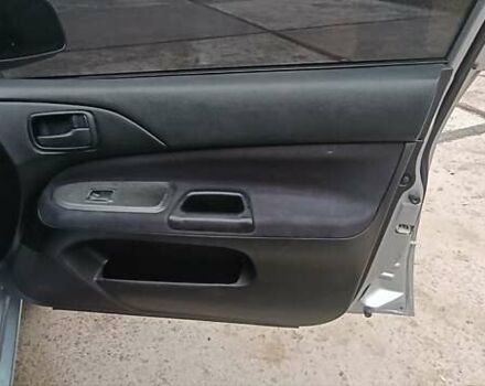 Сірий Міцубісі Lancer, об'ємом двигуна 1.6 л та пробігом 176 тис. км за 4999 $, фото 30 на Automoto.ua