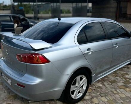 Сірий Міцубісі Lancer, об'ємом двигуна 2 л та пробігом 238 тис. км за 6400 $, фото 7 на Automoto.ua
