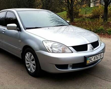 Серый Мицубиси Лансер, объемом двигателя 1.58 л и пробегом 176 тыс. км за 5000 $, фото 8 на Automoto.ua