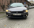Сірий Міцубісі Lancer, об'ємом двигуна 2 л та пробігом 131 тис. км за 4899 $, фото 1 на Automoto.ua