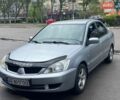Серый Мицубиси Лансер, объемом двигателя 1.59 л и пробегом 525 тыс. км за 3500 $, фото 1 на Automoto.ua