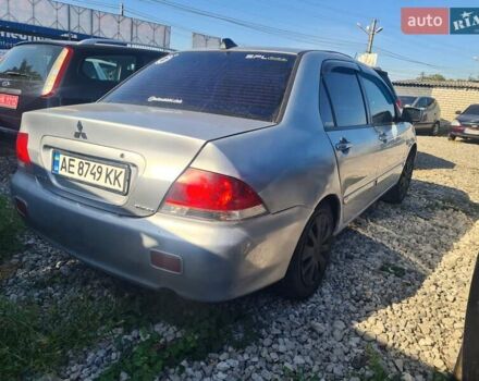Сірий Міцубісі Lancer, об'ємом двигуна 1.6 л та пробігом 240 тис. км за 2999 $, фото 6 на Automoto.ua