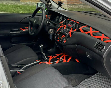 Сірий Міцубісі Lancer, об'ємом двигуна 1.6 л та пробігом 269 тис. км за 3999 $, фото 17 на Automoto.ua