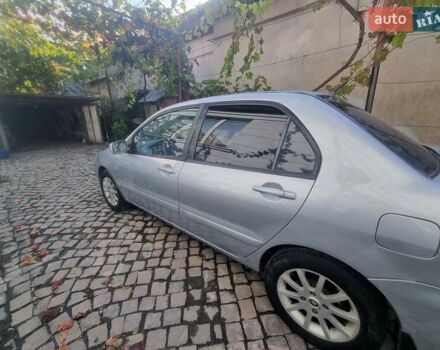 Сірий Міцубісі Lancer, об'ємом двигуна 1.6 л та пробігом 290 тис. км за 3850 $, фото 6 на Automoto.ua