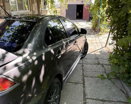 Сірий Міцубісі Lancer, об'ємом двигуна 1.5 л та пробігом 255 тис. км за 8000 $, фото 9 на Automoto.ua