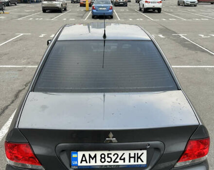 Серый Мицубиси Лансер, объемом двигателя 1.58 л и пробегом 183 тыс. км за 3800 $, фото 7 на Automoto.ua