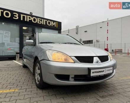 Сірий Міцубісі Lancer, об'ємом двигуна 1.6 л та пробігом 206 тис. км за 4799 $, фото 9 на Automoto.ua