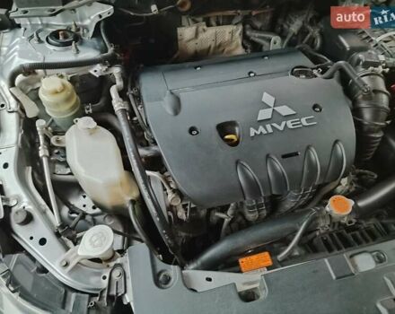 Серый Мицубиси Лансер, объемом двигателя 2 л и пробегом 234 тыс. км за 7200 $, фото 11 на Automoto.ua