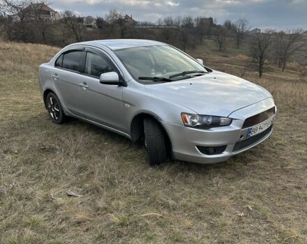 Серый Мицубиси Лансер, объемом двигателя 1.5 л и пробегом 321 тыс. км за 3900 $, фото 1 на Automoto.ua