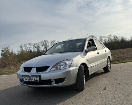 Серый Мицубиси Лансер, объемом двигателя 1.6 л и пробегом 228 тыс. км за 4500 $, фото 1 на Automoto.ua