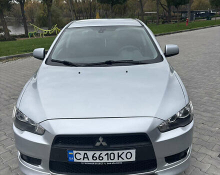 Серый Мицубиси Лансер, объемом двигателя 2 л и пробегом 211 тыс. км за 7100 $, фото 3 на Automoto.ua