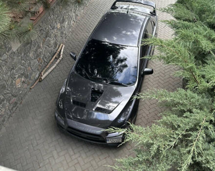 Сірий Міцубісі Lancer, об'ємом двигуна 1.5 л та пробігом 255 тис. км за 8000 $, фото 3 на Automoto.ua