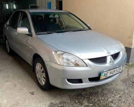 Сірий Міцубісі Lancer, об'ємом двигуна 1.6 л та пробігом 196 тис. км за 4700 $, фото 4 на Automoto.ua