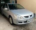 Сірий Міцубісі Lancer, об'ємом двигуна 1.6 л та пробігом 196 тис. км за 4700 $, фото 4 на Automoto.ua