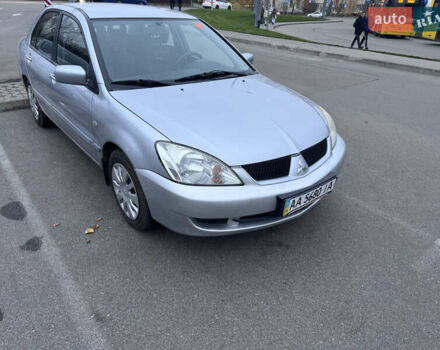 Серый Мицубиси Лансер, объемом двигателя 1.58 л и пробегом 330 тыс. км за 3500 $, фото 2 на Automoto.ua