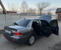 Серый Мицубиси Лансер, объемом двигателя 1.6 л и пробегом 225 тыс. км за 3350 $, фото 21 на Automoto.ua