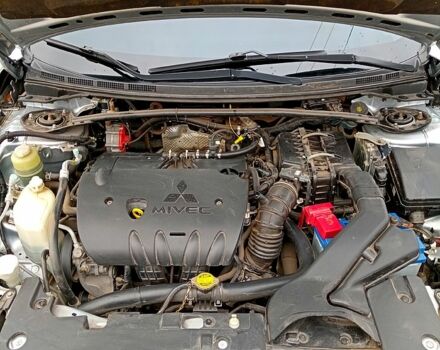 Серый Мицубиси Лансер, объемом двигателя 2 л и пробегом 243 тыс. км за 5500 $, фото 13 на Automoto.ua