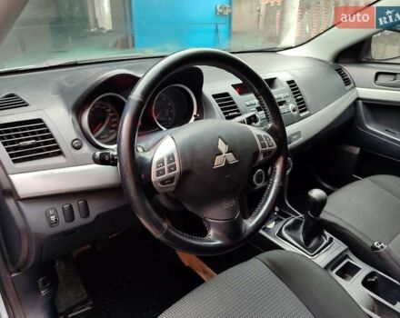 Серый Мицубиси Лансер, объемом двигателя 2 л и пробегом 234 тыс. км за 7200 $, фото 14 на Automoto.ua