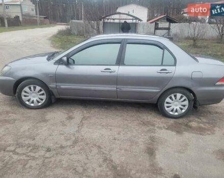 Сірий Міцубісі Lancer, об'ємом двигуна 1.6 л та пробігом 440 тис. км за 4200 $, фото 4 на Automoto.ua