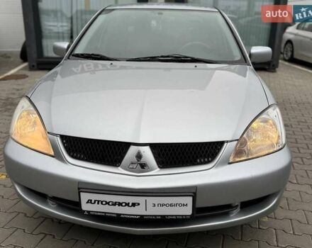 Сірий Міцубісі Lancer, об'ємом двигуна 1.6 л та пробігом 206 тис. км за 4799 $, фото 10 на Automoto.ua