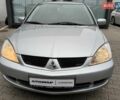 Сірий Міцубісі Lancer, об'ємом двигуна 1.6 л та пробігом 206 тис. км за 4799 $, фото 10 на Automoto.ua