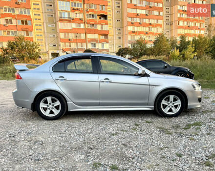 Сірий Міцубісі Lancer, об'ємом двигуна 2 л та пробігом 223 тис. км за 7390 $, фото 6 на Automoto.ua