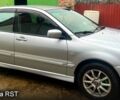Сірий Міцубісі Lancer, об'ємом двигуна 1.6 л та пробігом 282 тис. км за 4699 $, фото 1 на Automoto.ua