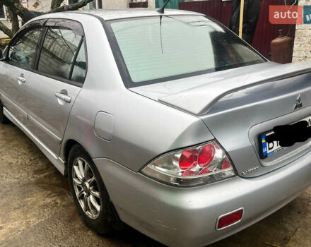 Серый Мицубиси Лансер, объемом двигателя 1.6 л и пробегом 282 тыс. км за 4699 $, фото 2 на Automoto.ua