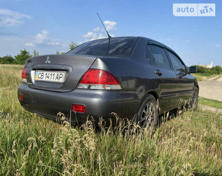 Сірий Міцубісі Lancer, об'ємом двигуна 1.6 л та пробігом 165 тис. км за 5200 $, фото 5 на Automoto.ua