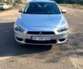 Серый Мицубиси Лансер, объемом двигателя 2 л и пробегом 151 тыс. км за 6099 $, фото 1 на Automoto.ua