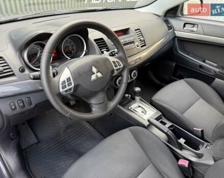 Серый Мицубиси Лансер, объемом двигателя 2 л и пробегом 230 тыс. км за 6900 $, фото 37 на Automoto.ua