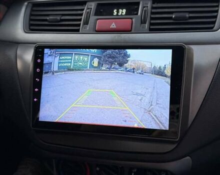 Серый Мицубиси Лансер, объемом двигателя 1.58 л и пробегом 145 тыс. км за 4800 $, фото 1 на Automoto.ua