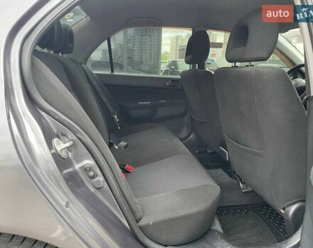 Серый Мицубиси Лансер, объемом двигателя 1.58 л и пробегом 146 тыс. км за 5490 $, фото 10 на Automoto.ua