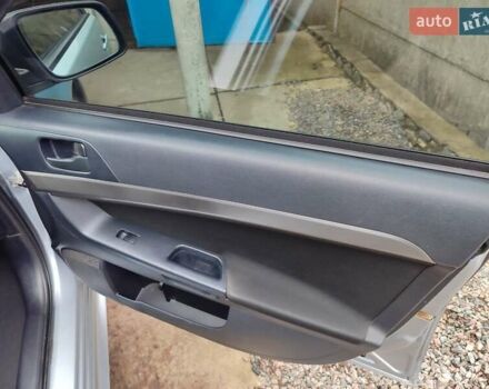 Серый Мицубиси Лансер, объемом двигателя 2 л и пробегом 234 тыс. км за 7200 $, фото 21 на Automoto.ua