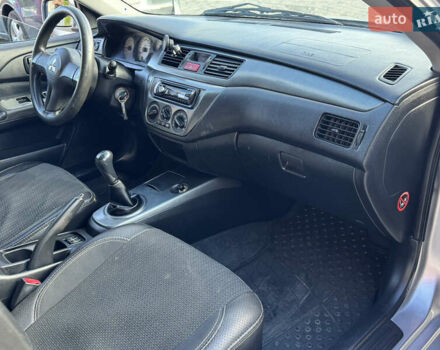 Мицубиси Лансер 2008 в Одессе на Automoto.ua Серый Мицубиси Лансер, объемом двигателя 1.6 л и пробегом 221 тыс. км за 3700 $, фото 19 на Automoto.ua