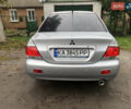 Сірий Міцубісі Lancer, об'ємом двигуна 1.58 л та пробігом 240 тис. км за 4299 $, фото 6 на Automoto.ua