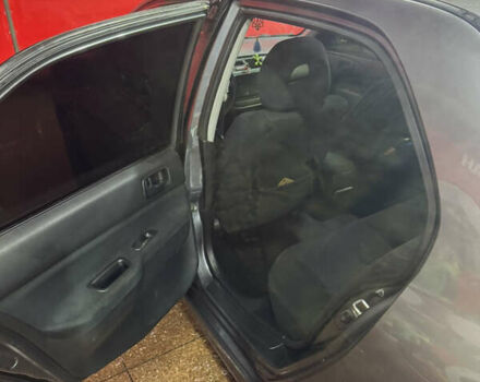 Серый Мицубиси Лансер, объемом двигателя 1.6 л и пробегом 268 тыс. км за 4600 $, фото 9 на Automoto.ua